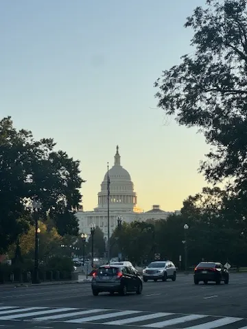 Evening view down a street towards the US Capitol