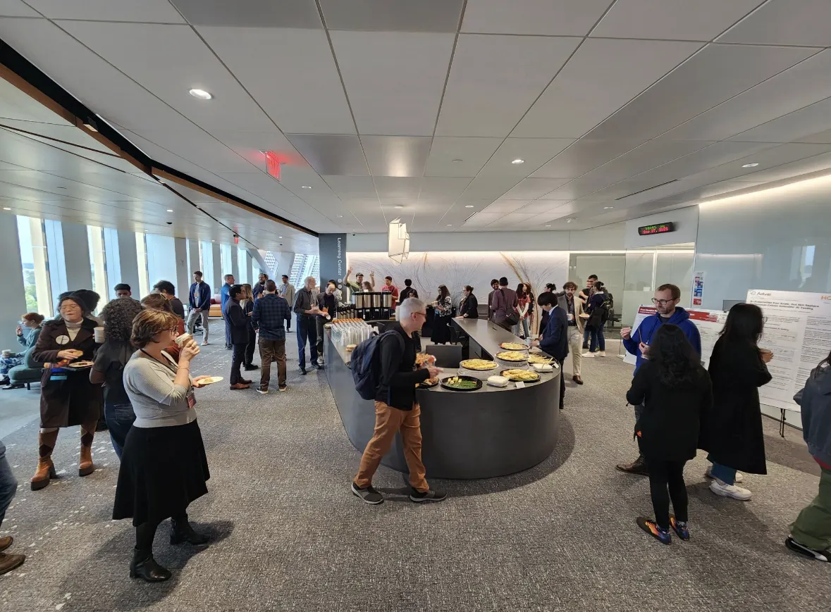 Attendees mingling at the conference reception